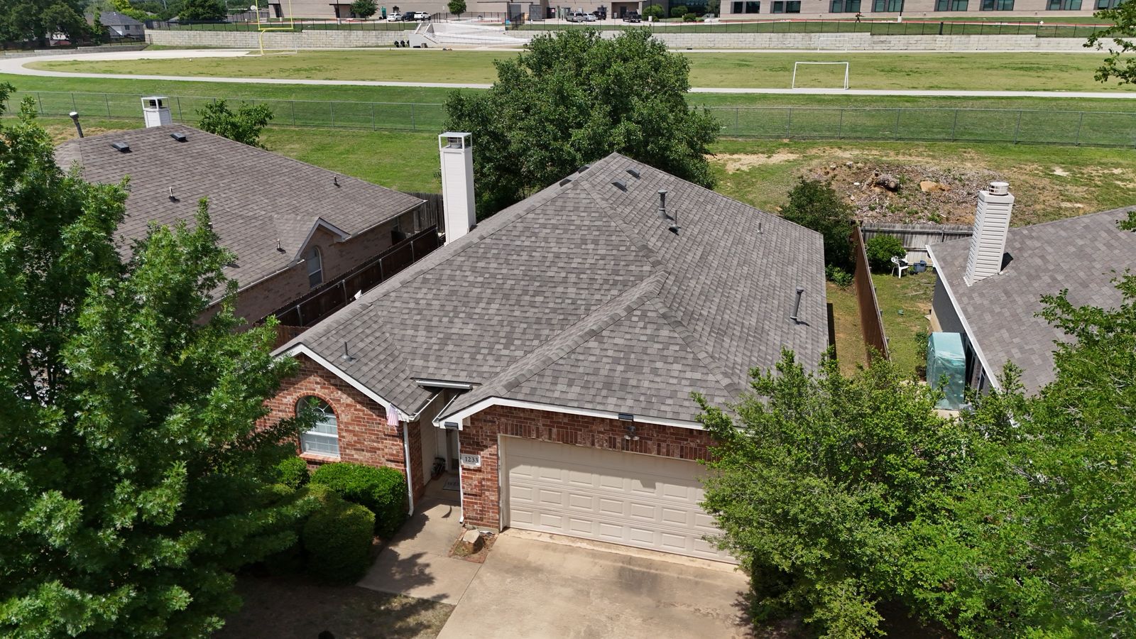 Completed Prestige roof in Weather Wood shingles