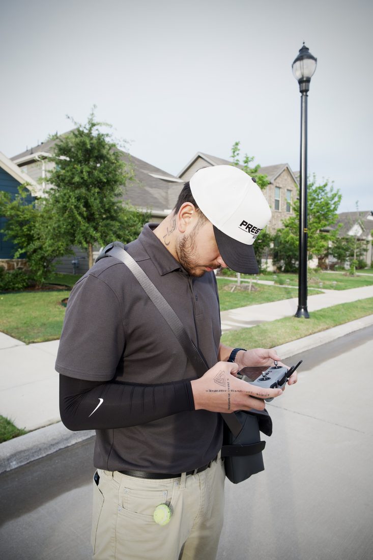 Prestige consultant flying the inspection drone